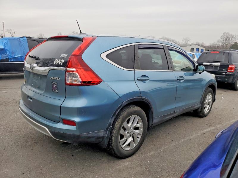 Photo 3 from auction – 2015 HONDA CR-V with VIN 5J6RM4H73FL050042