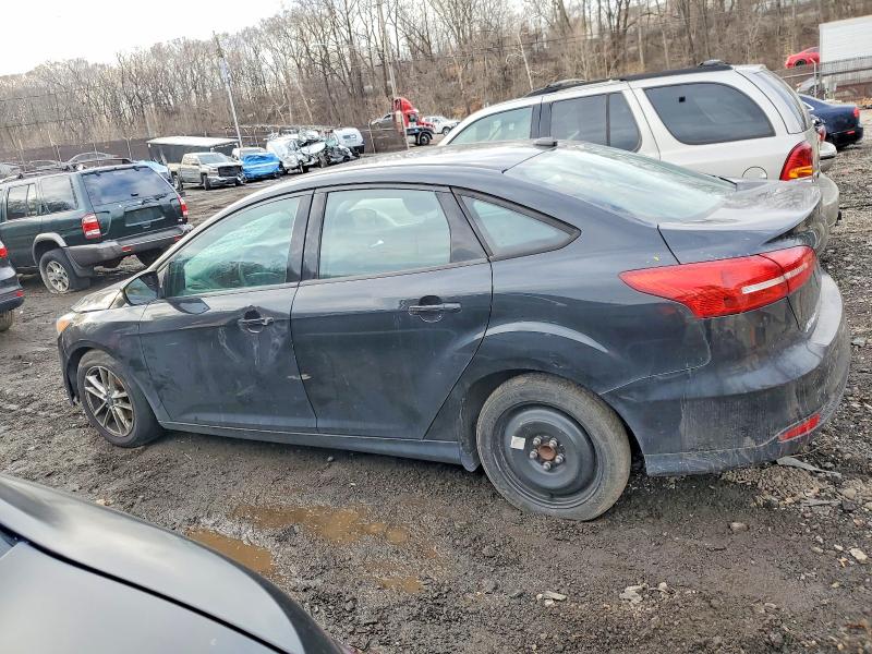 Photo 2 from auction – 2015 FORD FOCUS SE with VIN 1FADP3F25FL355606