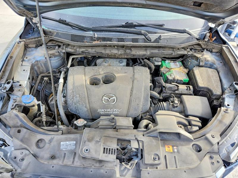 Photo 11 from auction – 2014 MAZDA CX-5 GT with VIN JM3KE2DY4E0403712