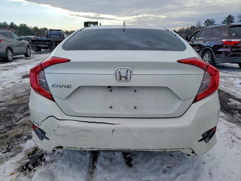 Photo 6 from auction – 2018 HONDA CIVIC with VIN 2HGFC2F71JH525911