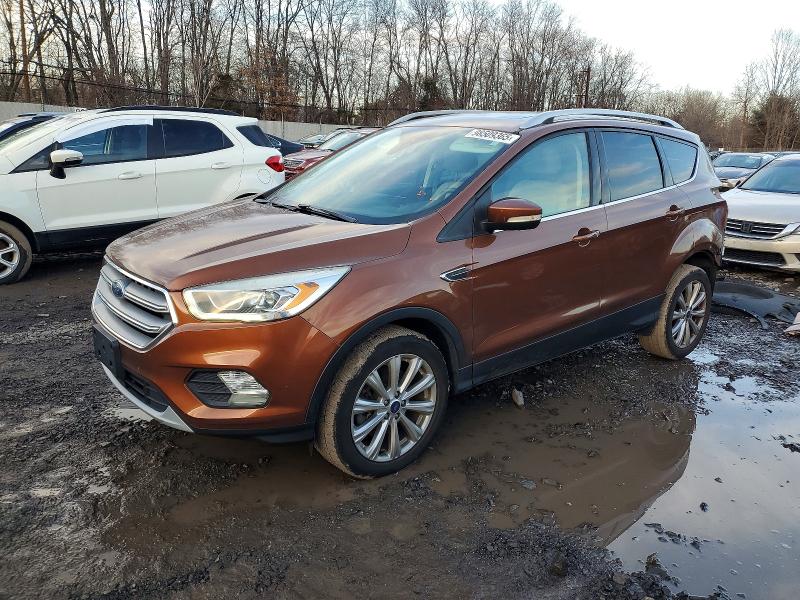 FORD ESCAPE TIT 2017 with VIN 1FMCU9JD1HUC71611 - Photo from auction