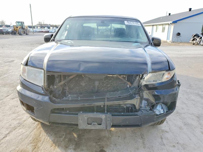Photo 5 from auction – 2011 HONDA RIDGELINE with VIN 5FPYK1F59BB452630