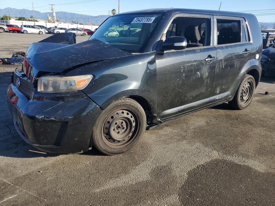 SCION XB 2009 with VIN JTLKE50E691093329 - Photo from auction