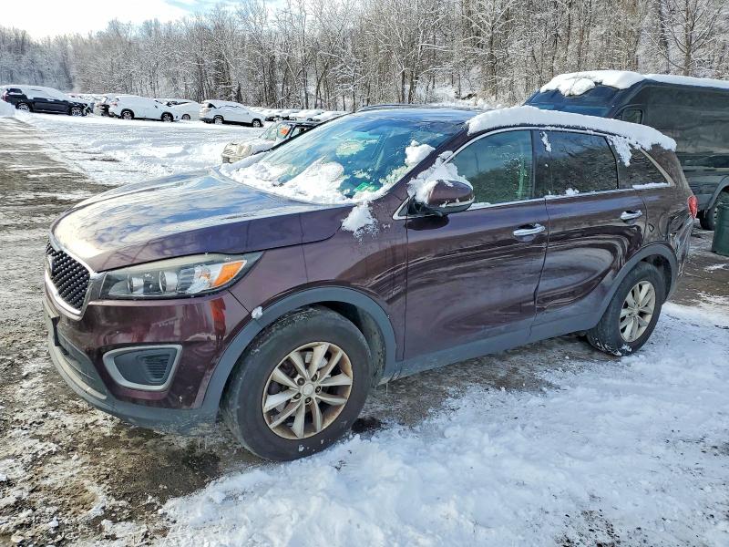 KIA SORENTO 2016 with VIN 5XYPG4A34GG058935 - Photo from auction