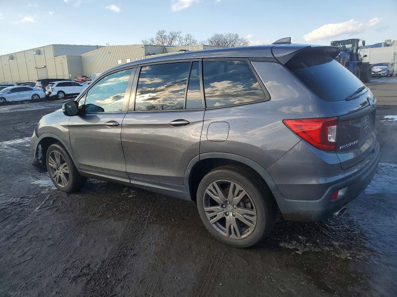 Photo 2 from auction – 2021 HONDA PASSPORT E with VIN 5FNYF8H57MB013917