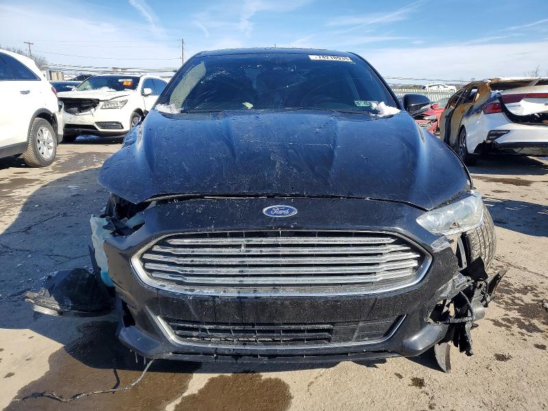 Photo 5 from auction – 2016 FORD FUSION TIT with VIN 3FA6P0D99GR272660