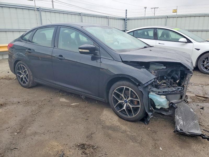 Photo 4 from auction – 2017 FORD FOCUS SEL with VIN 1FADP3H26HL203575