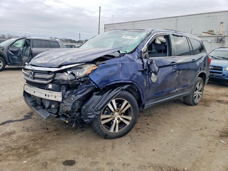 HONDA PILOT EXL 2018 with VIN 5FNYF6H58JB042584 - Photo from auction