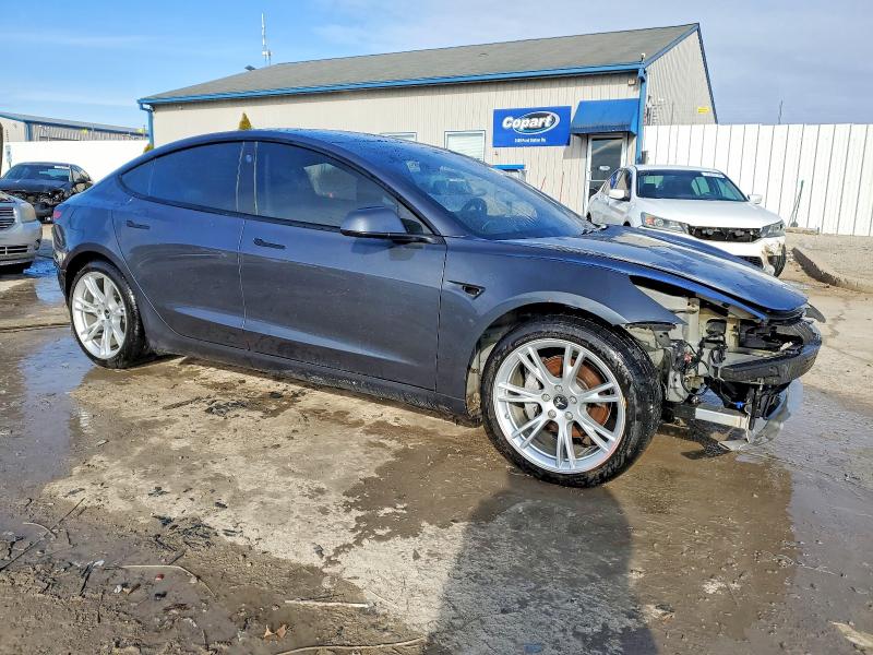 Photo 4 from auction – 2021 TESLA MODEL 3 with VIN 5YJ3E1EB1MF983549