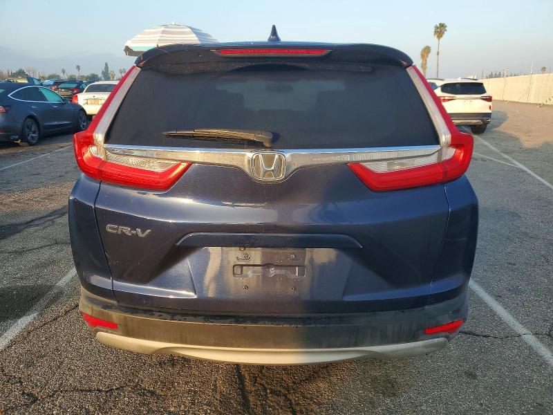 Photo 6 from auction – 2017 HONDA CR-V with VIN 7FARW1H83HE041147