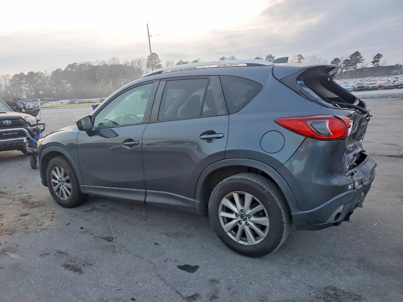 Photo 2 from auction – 2013 MAZDA CX-5 TOURI with VIN JM3KE4CE3D0157625