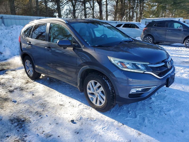 Photo 4 from auction – 2015 HONDA CR-V EXL with VIN 2HKRM4H75FH613070