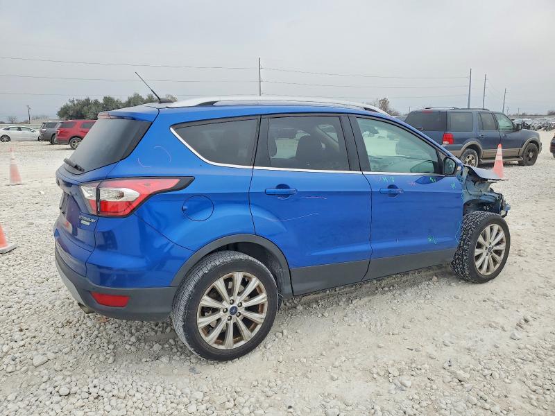 Photo 3 from auction – 2017 FORD ESCAPE TIT with VIN 1FMCU0J95HUC13797