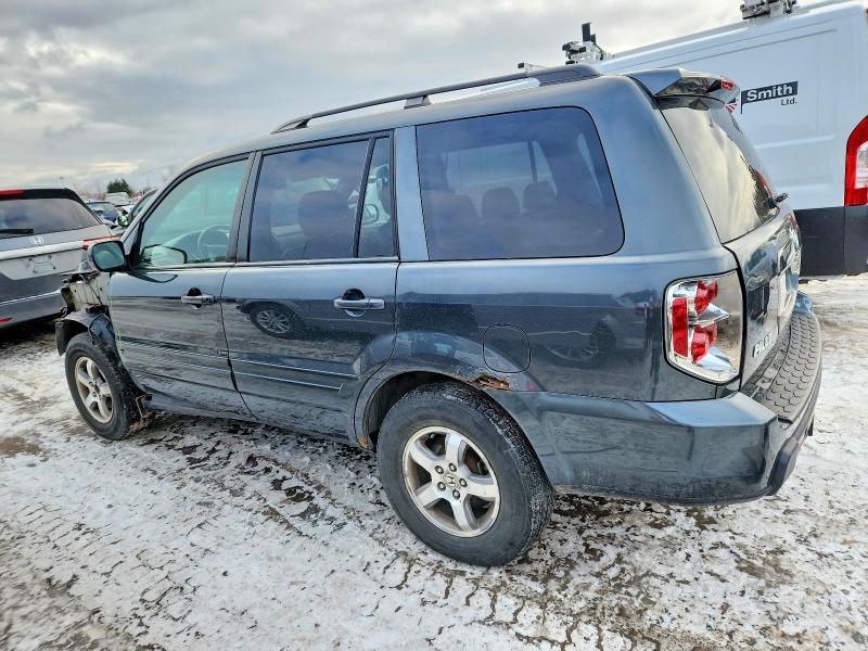 Photo 2 from auction – 2006 HONDA PILOT with VIN 2HKYF18506H003452