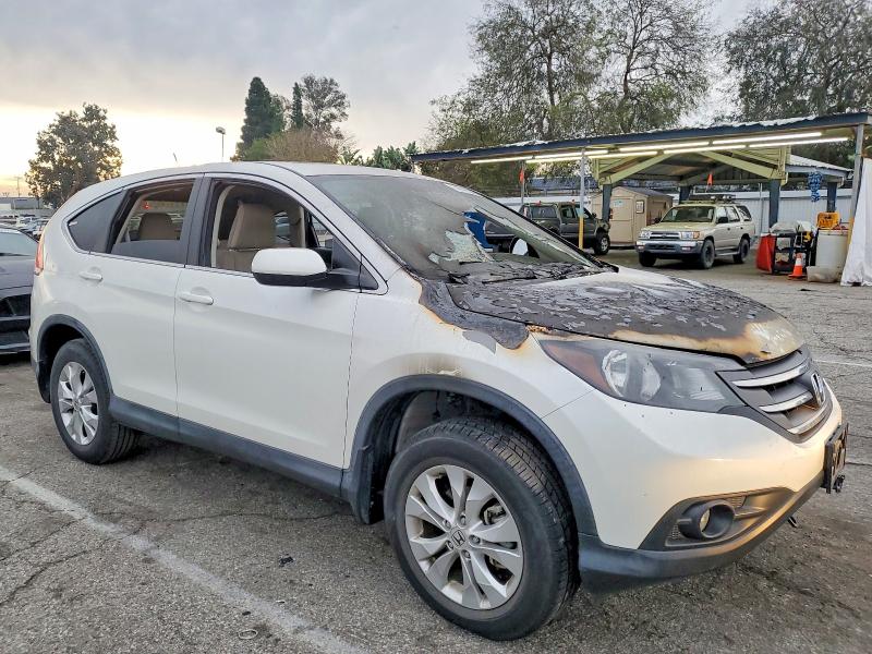 Photo 4 from auction – 2014 HONDA CR-V EX with VIN 5J6RM4H58EL098178
