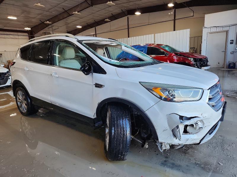 Photo 4 from auction – 2017 FORD ESCAPE TIT with VIN 1FMCU9J96HUB95699