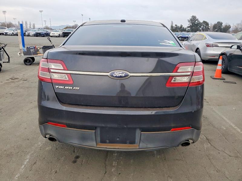 Photo 6 from auction – 2014 FORD TAURUS SE with VIN 1FAHP2D87EG145390