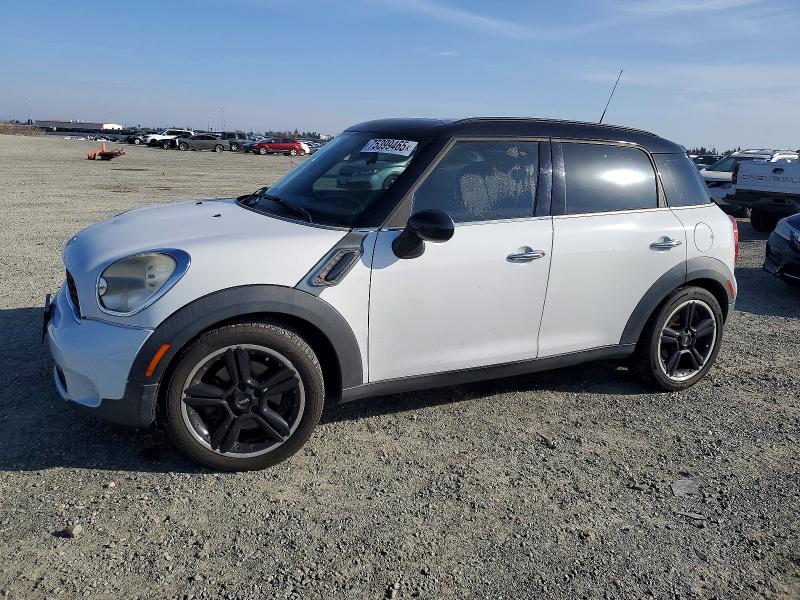 MINI COOPER COU 2011 with VIN WMWZC5C58BWH99142 - Photo from auction