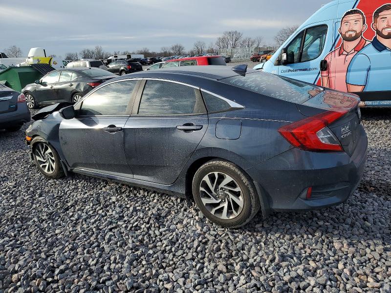 Photo 2 from auction – 2018 HONDA CIVIC with VIN 19XFC2F70JE029685