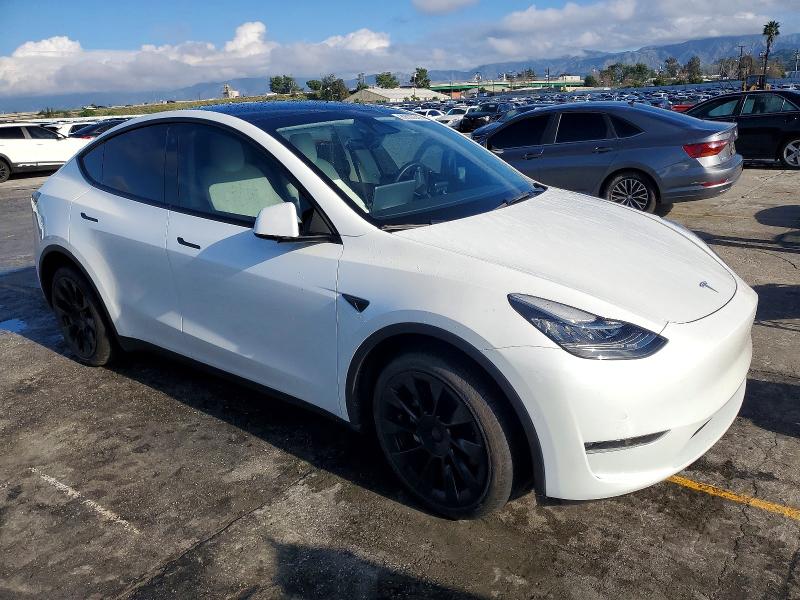 Photo 4 from auction – 2022 TESLA MODEL Y with VIN 7SAYGDEE7NF512246