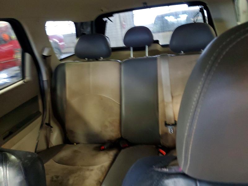 Photo 10 from auction – 2009 MERCURY MARINER PR with VIN 4M2CU87709KJ11758