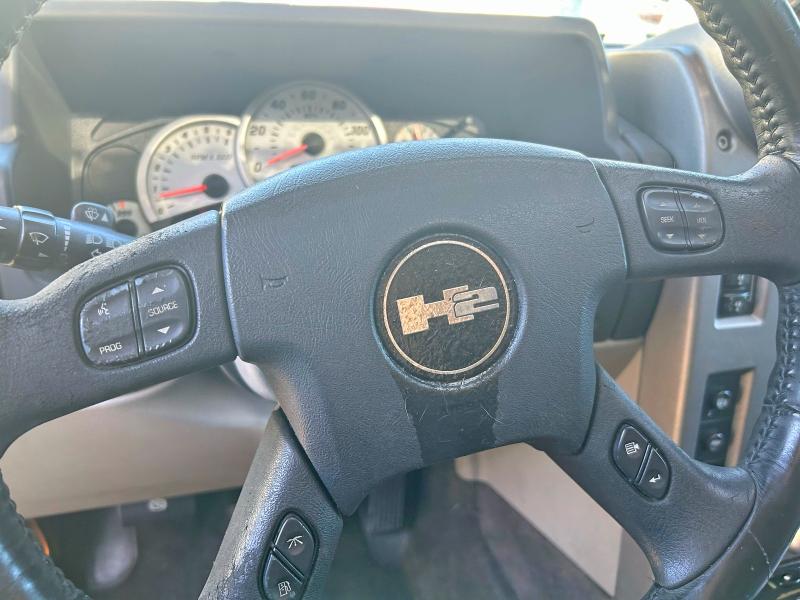 Photo 12 from auction – 2004 HUMMER H2 with VIN 5GRGN23U14H102259