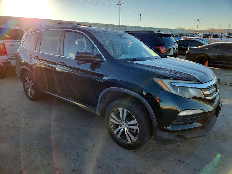 Photo 4 from auction – 2016 HONDA PILOT EX with VIN 5FNYF6H42GB069974