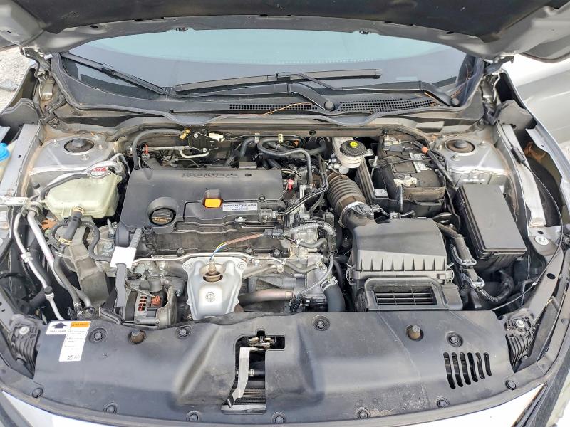 Photo 11 from auction – 2021 HONDA CIVIC LX with VIN 2HGFC2F6XMH527023