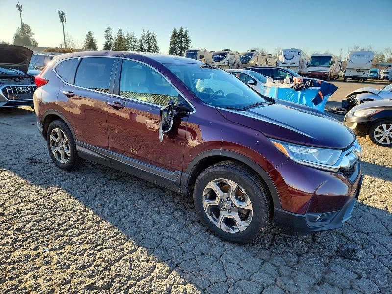 Photo 4 from auction – 2017 HONDA CR-V with VIN 2HKRW2H86HH645990