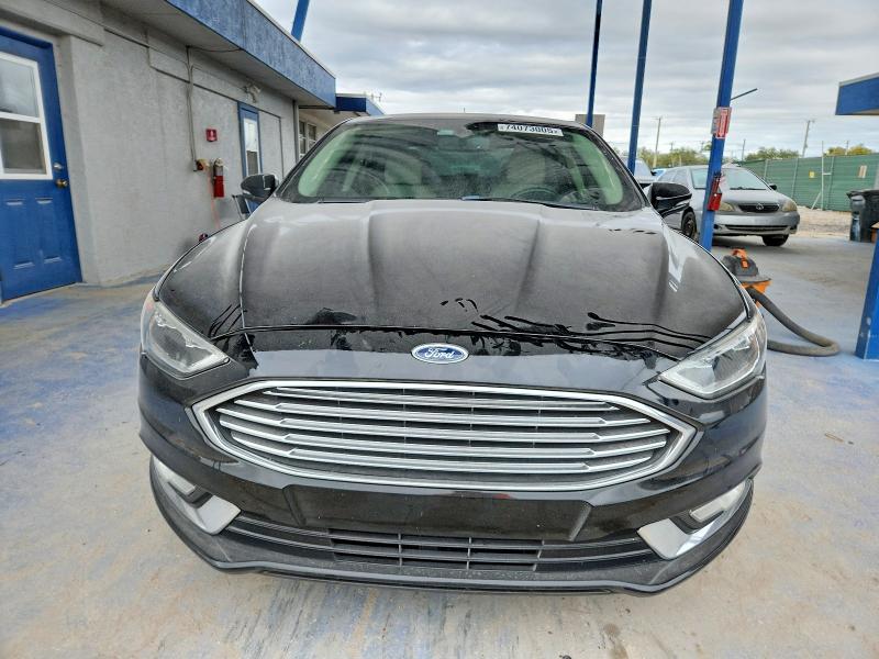 Photo 5 from auction – 2018 FORD FUSION TIT with VIN 3FA6P0RU8JR147279