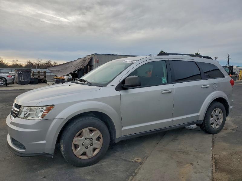 DODGE JOURNEY EX 2011 with VIN 3D4PG4FB6BT534624 - Photo from auction