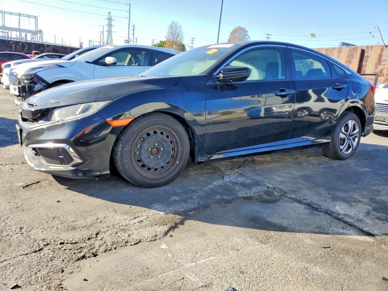 HONDA CIVIC LX 2020 with VIN 19XFC2F60LE212997 - Photo from auction