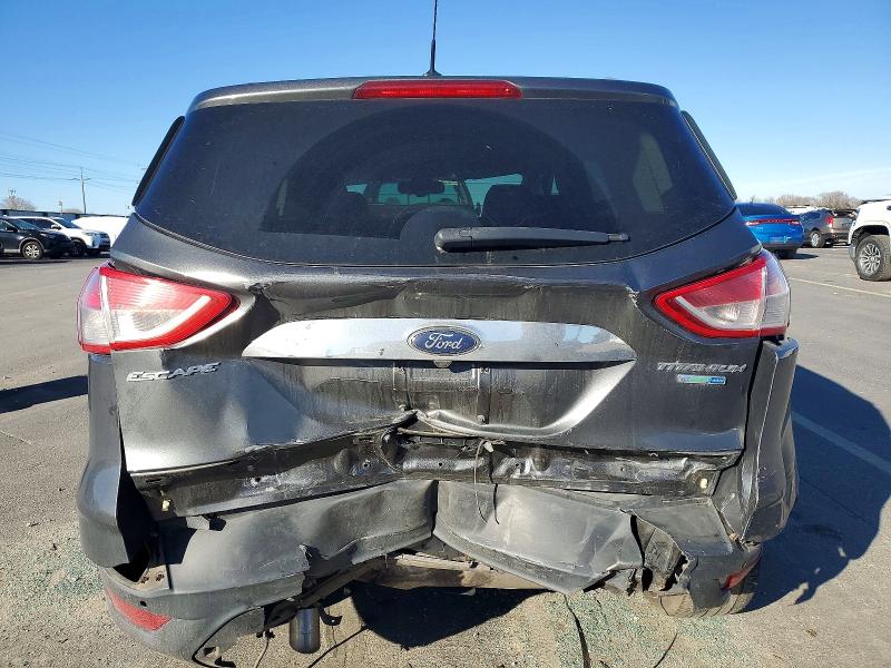 Снимка 6 от търг – 2015 FORD ESCAPE с VIN 1FMCU9J95FUB81337