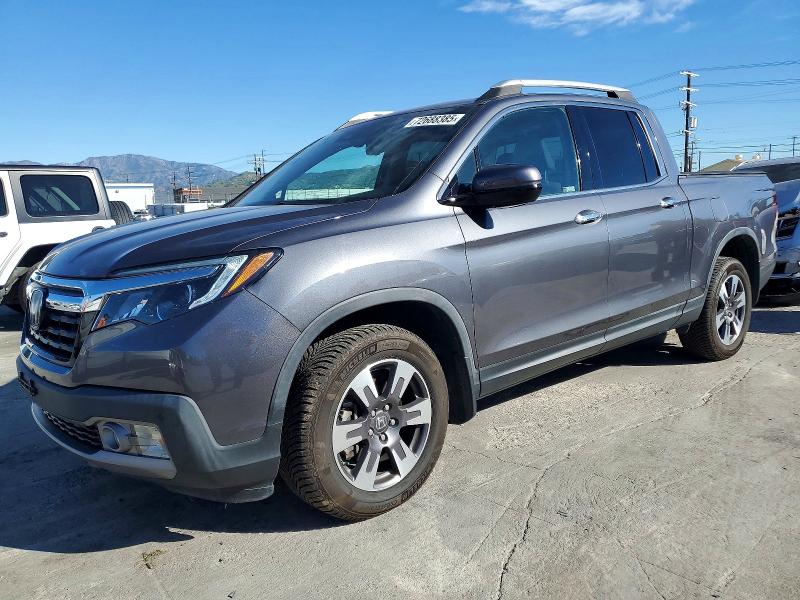 HONDA RIDGELINE 2018 with VIN 5FPYK3F74JB015548 - Photo from auction