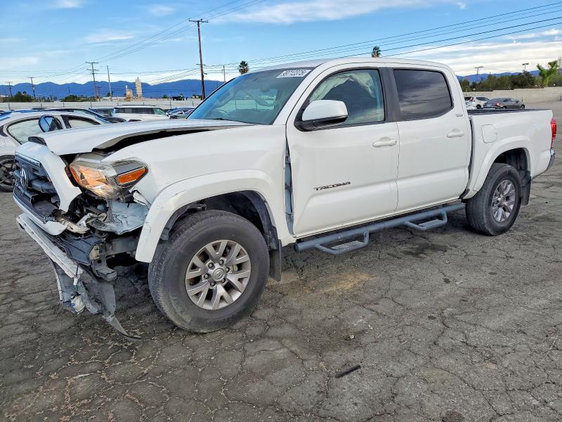 TOYOTA TACOMA 2017 with VIN 3TMAZ5CN7HM040700 - Photo from auction