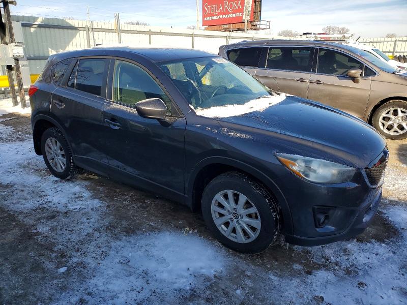 Photo 4 from auction – 2014 MAZDA CX-5 with VIN JM3KE4CY2E0329073