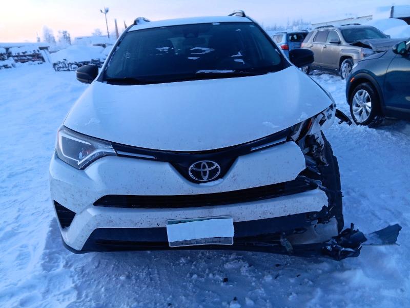 Photo 5 from auction – 2017 TOYOTA RAV4 LE with VIN JTMZFREV3HJ111310