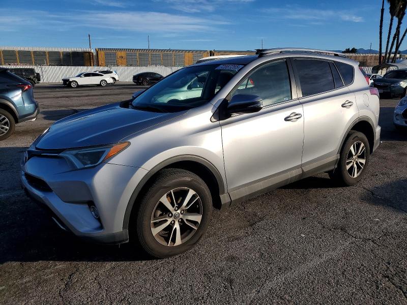 TOYOTA RAV4 XLE 2016 with VIN 2T3WFREV0GW244187 - Photo from auction