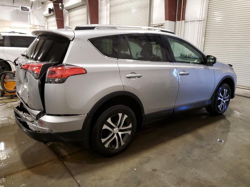 Photo 3 from auction – 2018 TOYOTA RAV4 LE with VIN 2T3BFREV5JW753097