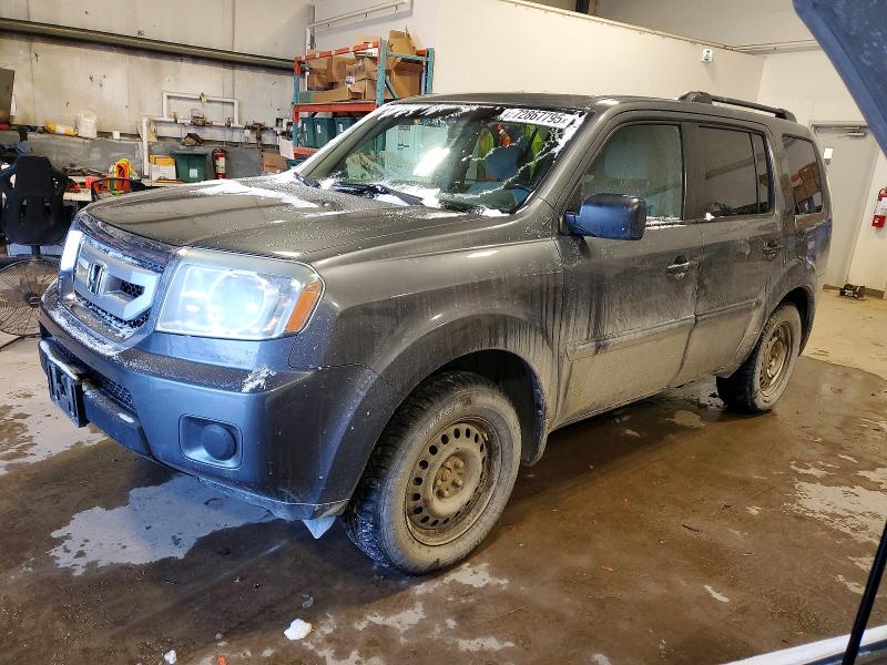 HONDA PILOT LX 2011 with VIN 5FNYF4H27BB502023 - Photo from auction