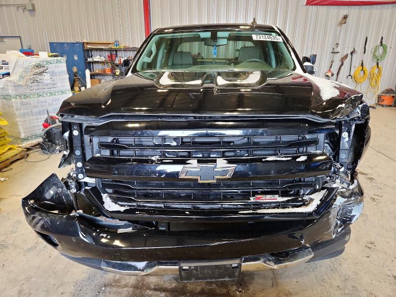 Photo 5 from auction – 2018 CHEVROLET SILVERADO with VIN 3GCUKREC9JG409470