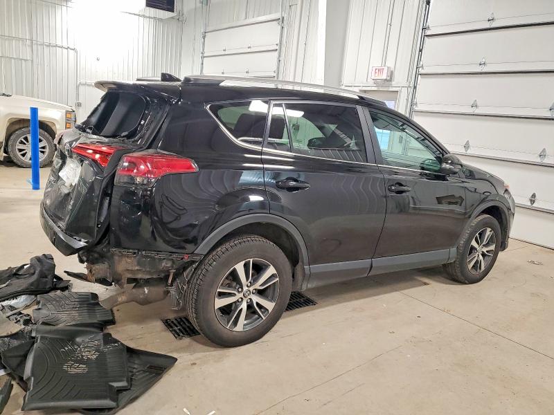 Photo 3 from auction – 2016 TOYOTA RAV4 XLE with VIN 2T3RFREV7GW518367