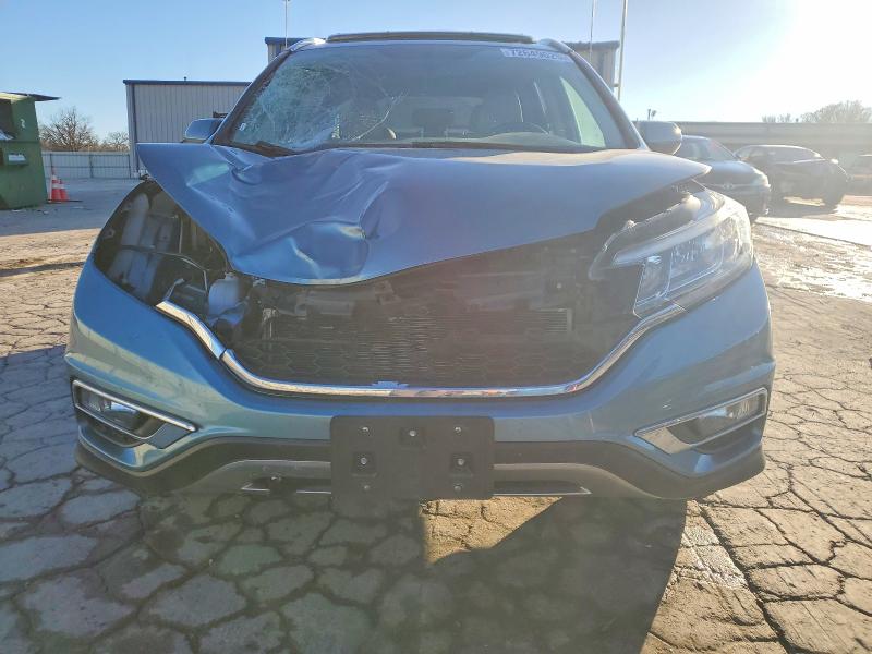 Photo 5 from auction – 2016 HONDA CR-V EXL with VIN 5J6RM4H75GL008795