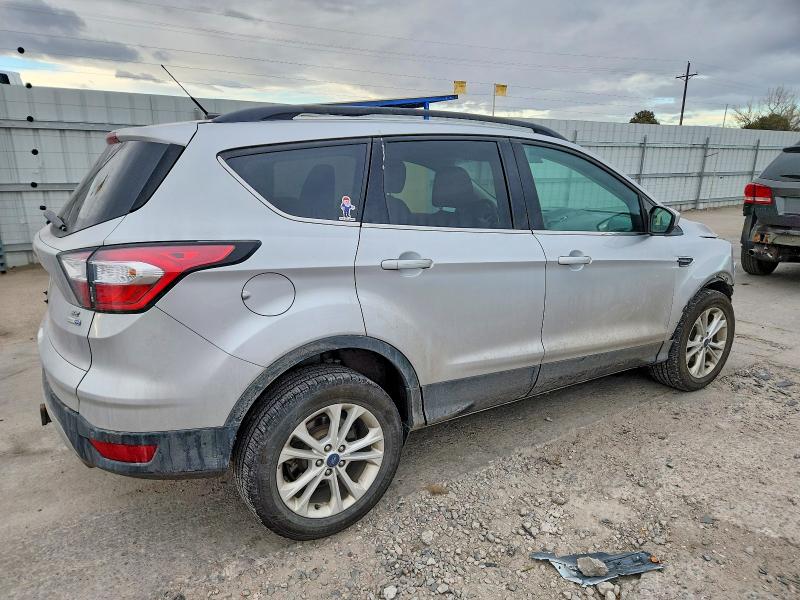 Photo 3 from auction – 2017 FORD ESCAPE with VIN 1FMCU9G99HUD39186