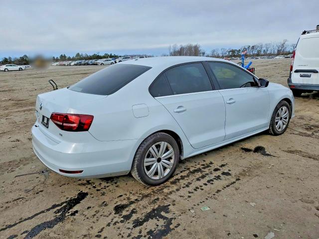 Photo 3 from auction – 2017 VOLKSWAGEN JETTA S with VIN 3VW2B7AJ4HM329311
