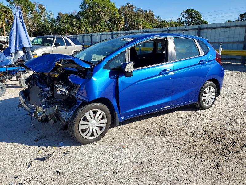 HONDA FIT LX 2015 with VIN 3HGGK5H5XFM777976 - Photo from auction