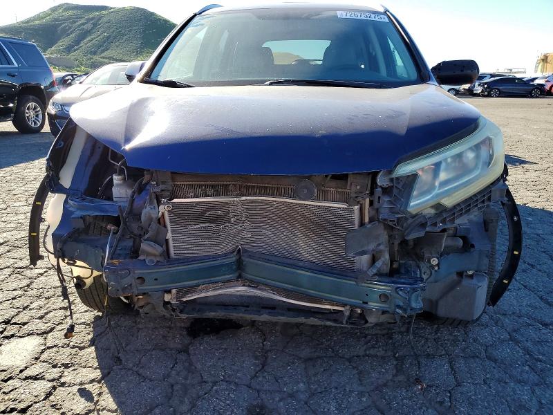 Photo 5 from auction – 2015 HONDA CR-V with VIN 2HKRM3H77FH517676
