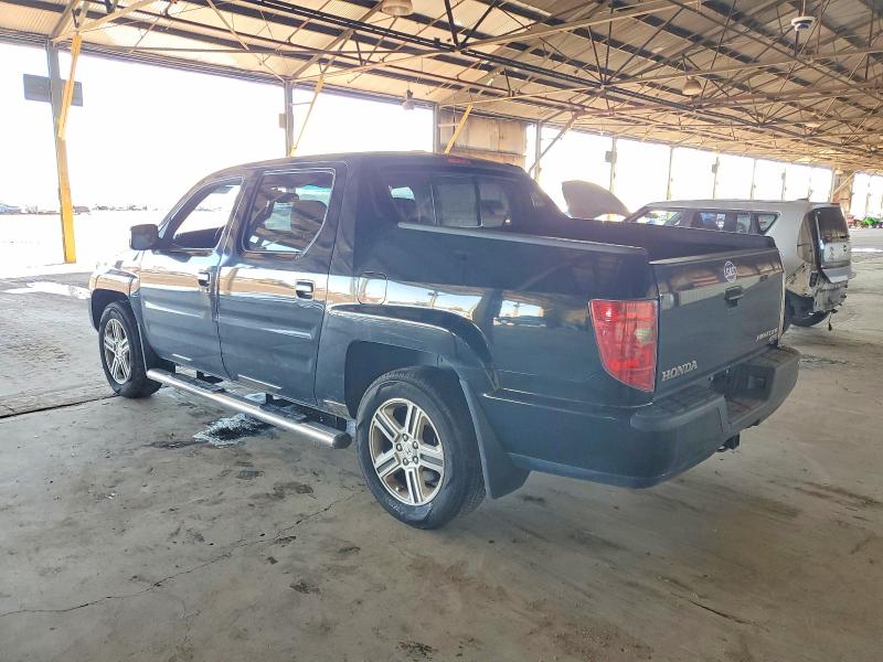 Photo 2 from auction – 2011 HONDA RIDGELINE with VIN 5FPYK1F56BB003809
