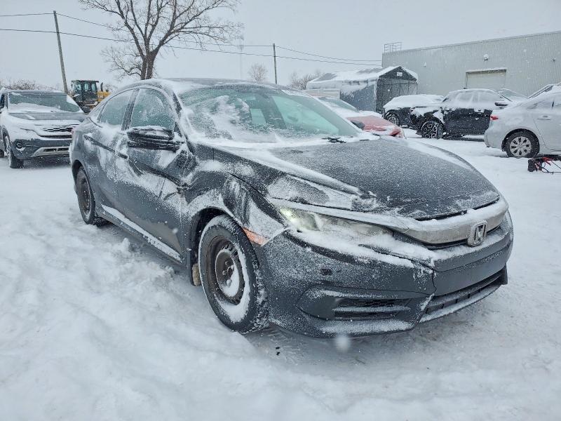 Photo 4 from auction – 2016 HONDA CIVIC EX with VIN 2HGFC2F74GH008773