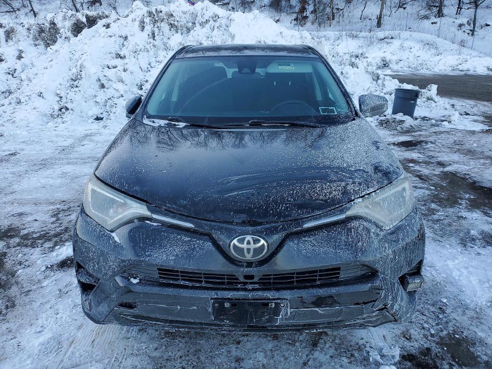 Photo 5 from auction – 2018 TOYOTA RAV4 LE with VIN 2T3BFREV2JW728562